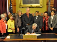 Branstad signs three more bills into law